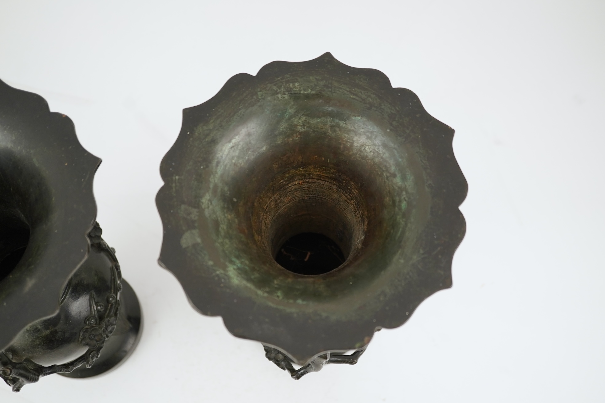 A pair of Chinese bronze gu-shaped vases, Qing dynasty